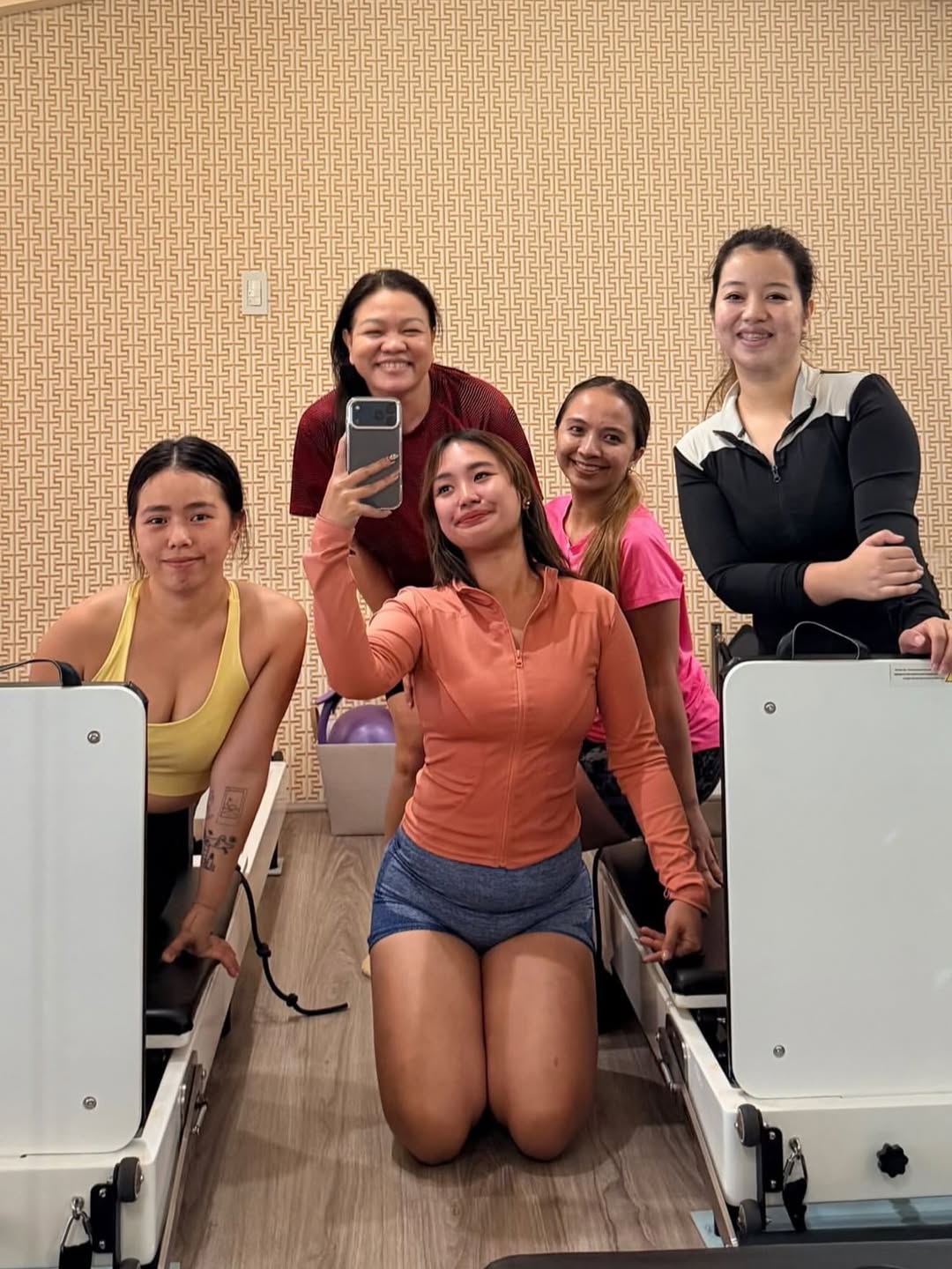 Reformer Pilates class at ORA